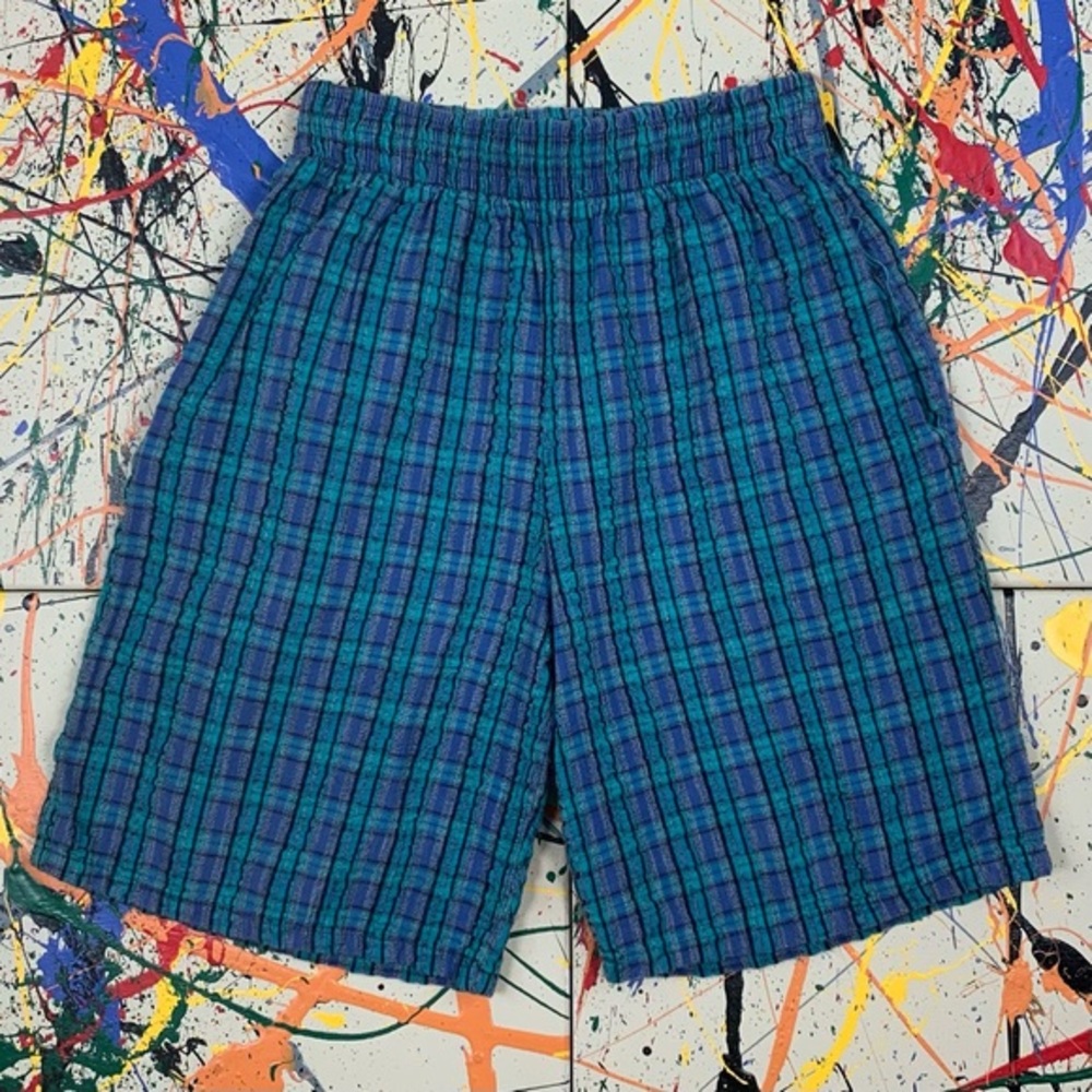 HONORS teal and purple shorts.